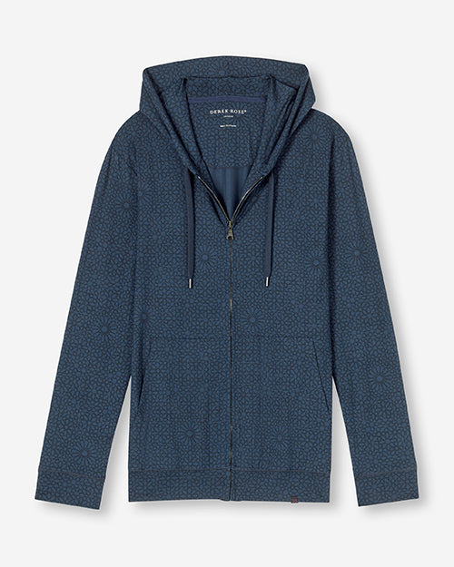 A full view of dark blue hooded zip-up jacket, featuring an all-over pattern of small, geometric shapes. The background is plain white.