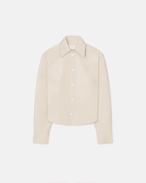 An Off-White long-sleeved button-down jacket with a collar and white buttons, placed against a white background.