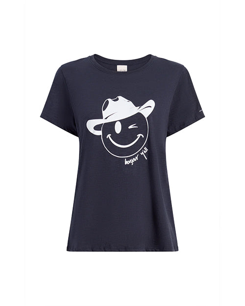 A navy crewneck t-shirt with a graphic of a smiling winky face wearing a cowboy hat. The shirt has the words "bonjour y'all" written in cursive below the face and is placed against a white background.