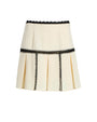 White skirt with black trim on a white background