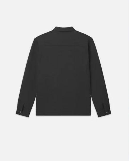 A backside view of a dark long-sleeve button-up shirt with buttons at the cuffs. The background is plain white.