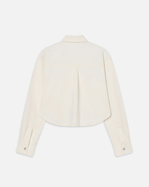 The backside view of a long sleeve collared white jacket. The jacket has silver buttons on each sleeve for closure and is set up in front of a white background.