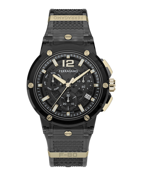 A frontal view of a sporty, black wristwatch with gold accents, the text "FERRAGAMO" at the top on a gold bar, and "F-80" at the bottom. The word "FERRAGAMO" also appears below the number "12" on the top of the watch face. The background is plain white.