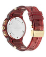 A backside view of a sporty red transparent wristwatch with a round silver case back engraved with "FERRAGAMO" at the center, along with "SWISS MADE," "SAPPHIRE CRYSTAL," and "5 ATM." The strap has a textured pattern and gold-tone accents, including a clasp with the Ferragamo logo. The background is plain white.