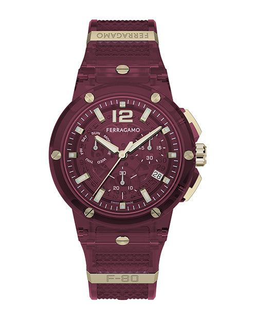 A frontal view of a sporty, burgundy-colored wristwatch with gold accents, the text "FERRAGAMO" at the top on a gold bar, and "F-80" at the bottom. The word "FERRAGAMO" also appears below the number "12" on the top of the watch face. The background is plain white.