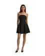 A full body view of a model wearing a strapless black dress that flares out at the bottom. The model is also wearing black pointed-toe shoes and standing against a plain white background.