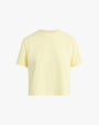 The frontside view of a light yellow short-sleeved t-shirt. The background is plain and white.