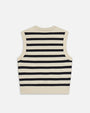 A backside view of a sleeveless knitted top with horizontal black- and cream-colored stripes against a white background.