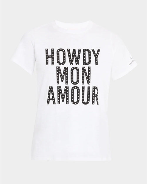 A white crewneck t-shirt with the text "HOWDY MON AMOUR" printed on it in large, black, capital letters, adorned with small gray dots. The shirt is placed against a white background.