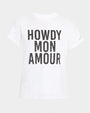 A white crewneck t-shirt with the text "HOWDY MON AMOUR" printed on it in large, black, capital letters, adorned with small gray dots. The shirt is placed against a white background.