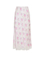 A long white skirt with delicate floral patterns and lace detailing at the hem. The background is plain white.