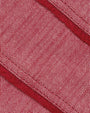 Close-up of red fabric with a textured pattern