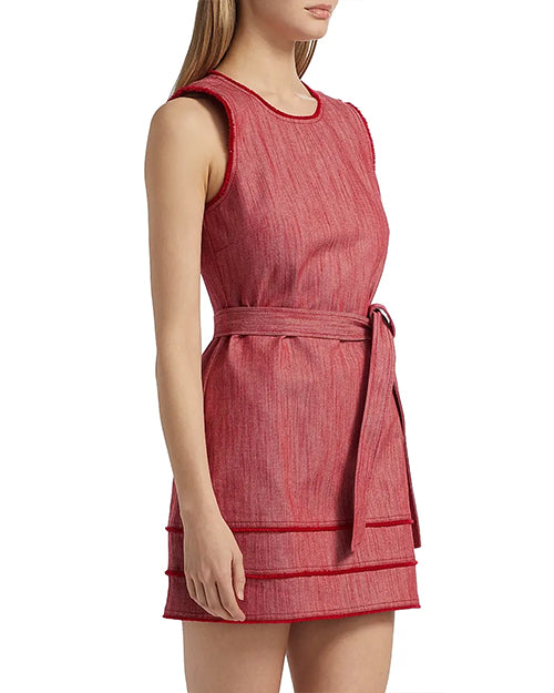 Front side view of a person wearing a sleeveless, knee-length red dress with a round neckline and a matching waist belt. The dress has a textured fabric and horizontal seam details near the hem.
