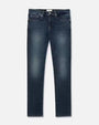 A full shot of a pair of dark jeans with a faded wash on the thighs and knees. The background is plain white.