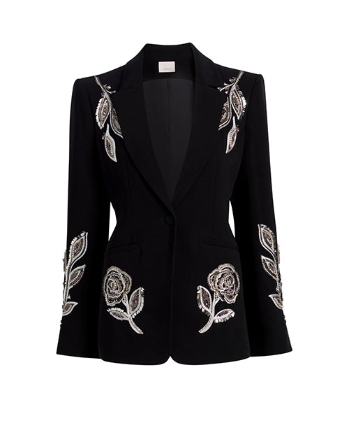 Black blazer with floral embellishments on a white background