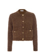 A brown, fuzzy textured cardigan featuring a high round neckline, gold buttons, and two waist pockets. The inner neckline has a white rectangular tag, and the sweater is placed in front of a white background.