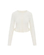 A full shot of a white, long-sleeved cardigan with a horizontal lace striped texture and frills at the waist, placed against a white background.