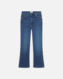 A frontal image of a pair of blue denim jeans, slightly flared at the bottom, with a faded look, particularly around the knees and thighs.