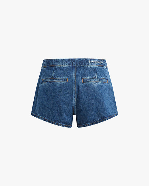 A pair of blue denim shorts with the words "Favorite Daughter" embroidered on the waist band. The shorts are placed in front of a white background.