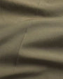 A close-up of green fabric.