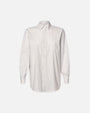 A white long-sleeve button-up shirt floating in front of a white background.