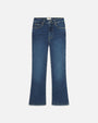 A pair of blue jeans with a slight fade and flared ends. The pants are placed against a white background.