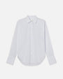 A white and light blue striped long-sleeve button-up shirt, placed in front of a white background.