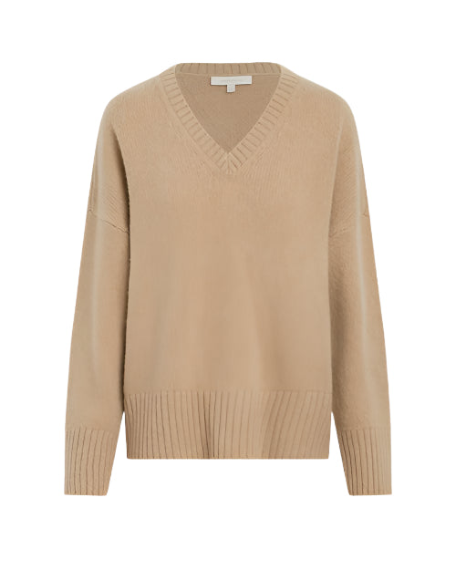 A beige V-neck sweater featuring thick wrist cuffs and a thick waistline with a ribbed design. The background is plain white.
