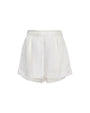 A pair of white linen shorts placed on a white background.