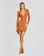 A full body view of a blonde model wearing an orange long sleeve dress with a ribbed material, a V-neck and gold buttons. The model is accessorizing with gold earrings, a gold clutch and gold pointed-toe heels.