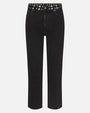 Front view of high-waisted black jeans with straight legs, shown flat against a white background, paired with a black studded belt.