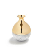 Marble bud vase is made from Carrara Marble at the bottom and polish gold on the top. White background.