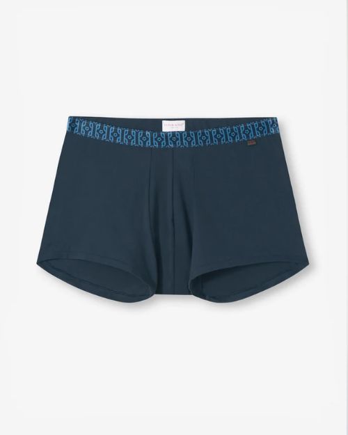 A pair of navy-blue boxer briefs with nautical knots print along the waistband, and a square tag inside of the waistband. The background is plain white.