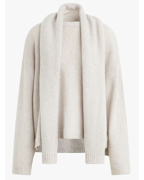 A light-colored, long-sleeved sweater with a matching scarf and ribbed cuffs. The background is plain white.