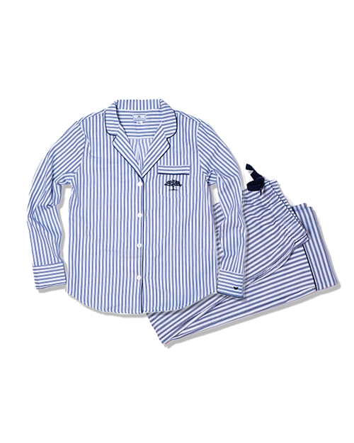 A blue and white striped long-sleeve button-down pajama shirt with a blue tree logo on the chest pocket, next to a folded pair of pants with an elastic drawstring waistband. The background is blank.