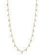 A gold chain necklace with evenly spaced crystal spikes along it. The background is plain white.