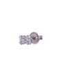A rectangular earring made up of rectangular and round diamonds and white stones arranged in a slightly asymmetrical design. The earring is showcasing its large circular earring backing and is placed against a white background.