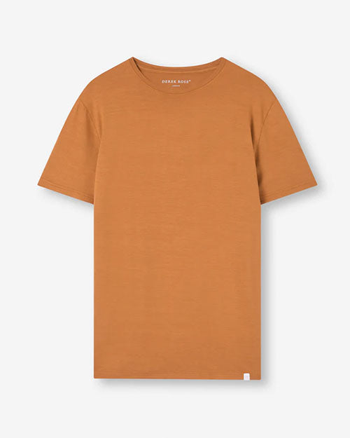 An orange t-shirt displayed flat, showcasing its vibrant color and simple design.