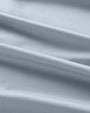  Light blue fabric with a folded edge, showcasing the soft, breathable texture of the Derek Rose Basel 23 T-shirt.