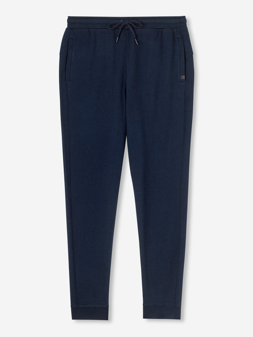 Navy blue joggers with a combined elastic and tie waistband with 2 pockets. 