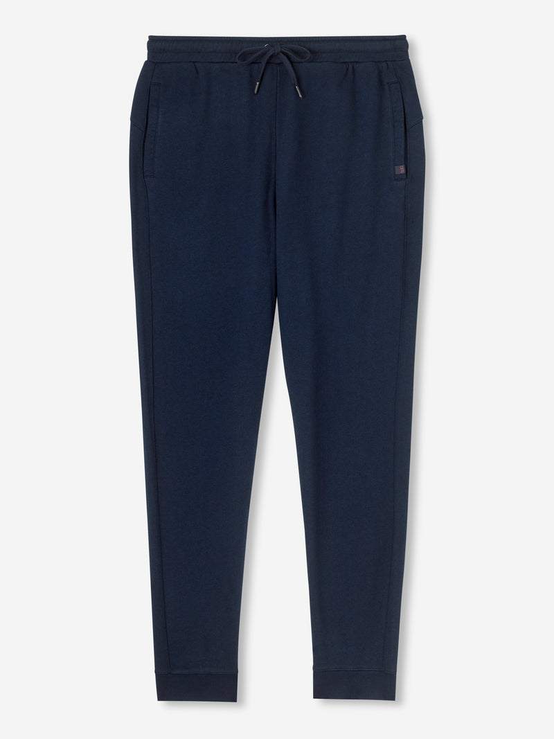 Navy blue joggers with a combined elastic and tie waistband with 2 pockets. 