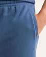 Blue shorts with a drawstring waistband, designed for comfort and casual wear.