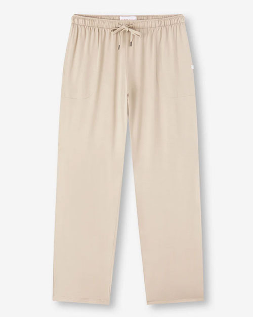 Beige pants featuring pockets and elastic cuffs, designed for comfort and practicality.