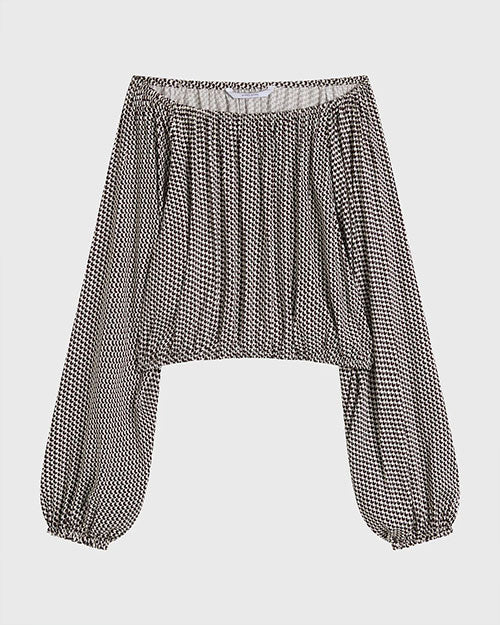 Brown-and-white patterned off-the-shoulder top with long balloon sleeves, elastic neckline, and gathered waist, shown against a light background.