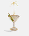 A decorative martini glass ornament adorned with a green holly leaf, symbolizing festive cheer.
