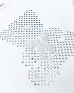 Up-close of the white t-shirt to show the small stones in the shape of a bear with a bow accent.