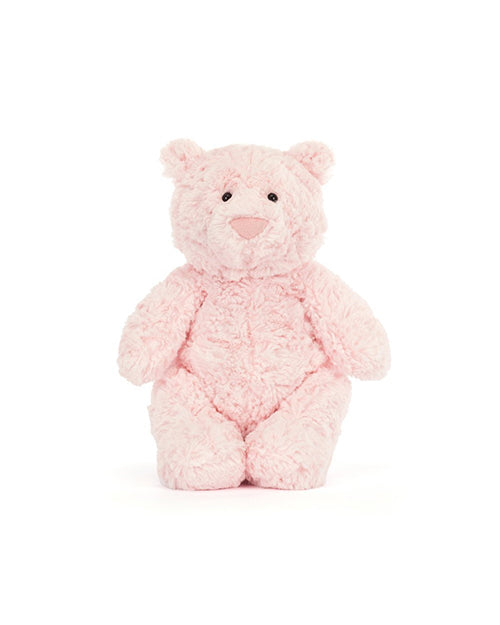 Pink teddy bear on a white background