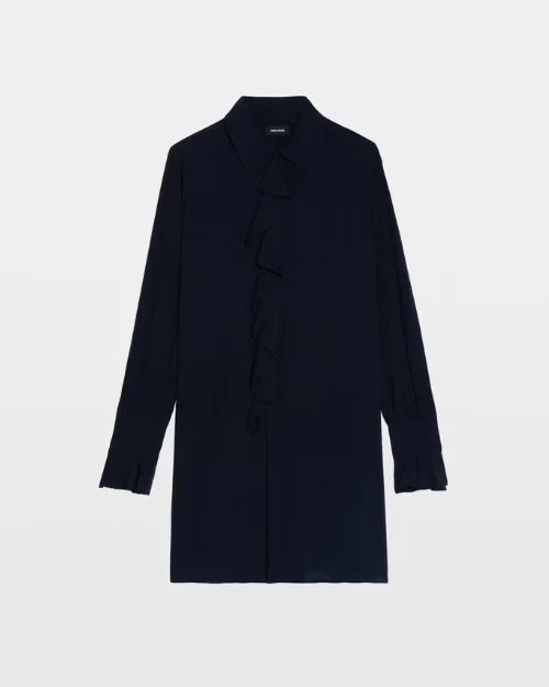 An image of a navy dress with a center ruffle on a white background. 