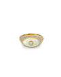 A diamond and gold ring, with an iridescent opal center in the shape of an eye, with a large diamond in the center. 