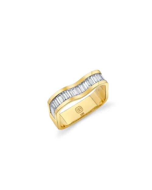 Gold and diamond ring with vertical baguettes scaling lengthwise. 